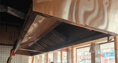 厨房里的“隐形卫士”：一场关于油烟与风味的“攻防战”